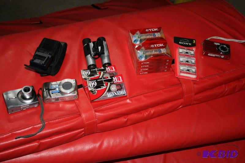 lot 128 image: Box Lot Including Kodak Easy Share C813 Camera Lumex Camera Panasonic Camera Cassettes And More