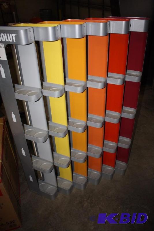 lot 201 image: Absolut Liquor Bottle Display Different Colors For Different Types 39 x 10 x 55.