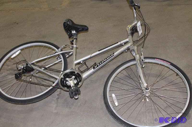 lot 461 image: Specialized 24 Rims 24 Speed Silver Frame Black Seat Black Grips.