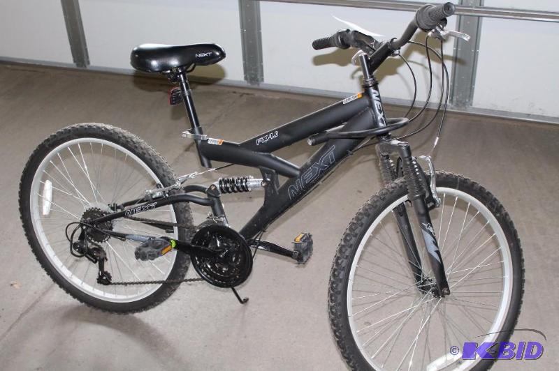 lot 471 image: Next PX-16 Bicycle Black Middle Shock Black Seat Gears & Brakes.