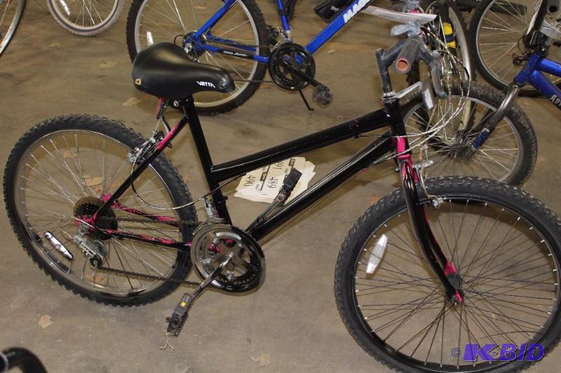 lot 488 image: Magna Womens 21 Speed Mountain Bike 20 Rims Kickstand Spray Painted Black wPink Showing Thru.