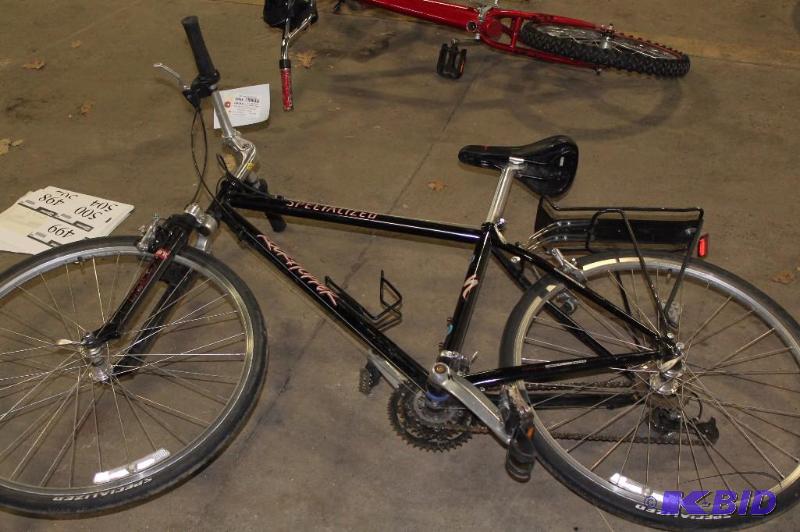 lot 497 image: Rock Hopper Specialized Bike Rack On Back Black Bike Seat 22 Rims Black.