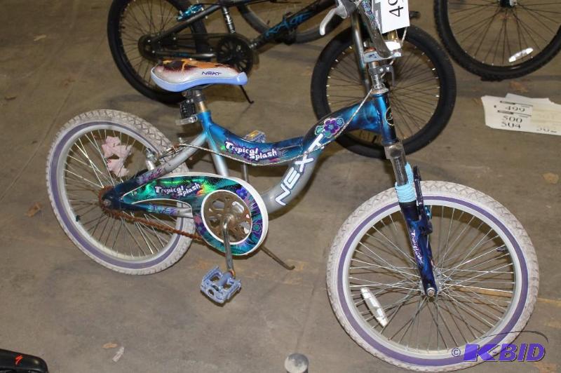 lot 498 image: Next Tropical Splash Bike BlueSilverPurple 16 Rims White Ties Purple Pedals.