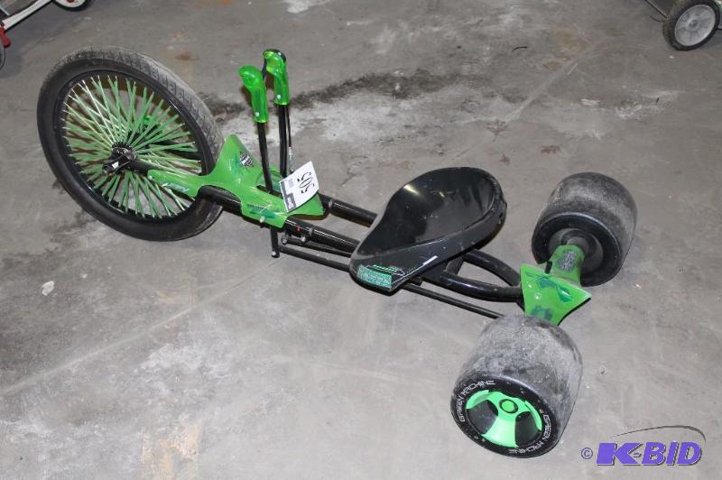 lot 505 image: Huffy Black & Green Tricycle Handpowered 16 Rims.