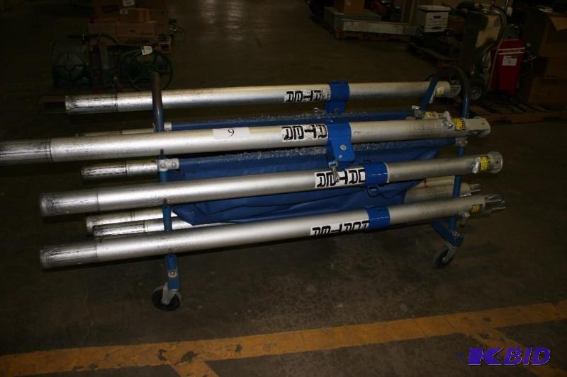 lot 9 image: Lot of Metal Volleyball Poles Does Not Include Cart.
