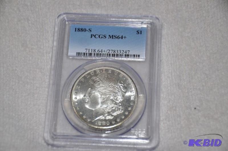 lot 31 image: 1880 S Morgan Silver Dollar graded by PCGS MS...