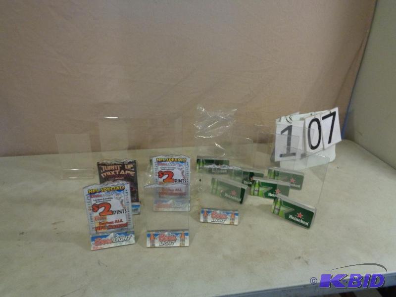 lot 107 image: Assorted Table Tents  Menu Holders. Heineken...