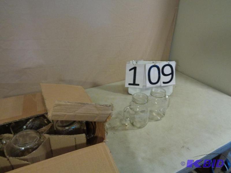 lot 109 image: 11 Twisted Tea Mason Jar Mugs. Look new but n...