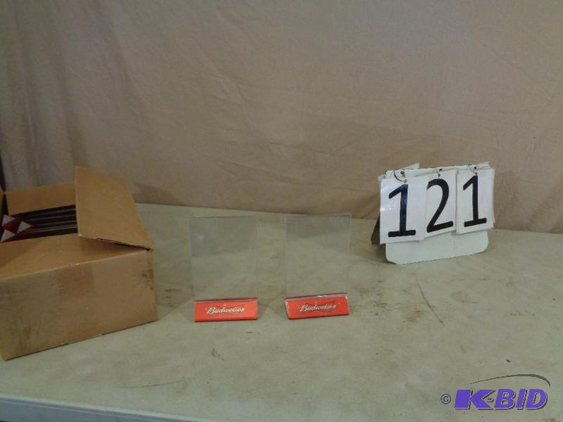 lot 121 image: Approximately 19 Budweiser Plastic Table Tent...