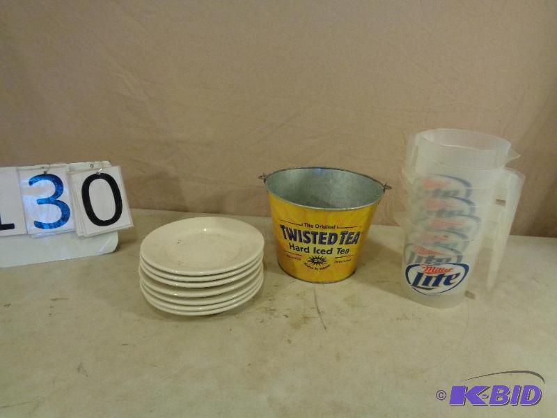 lot 130 image: Buffalo Plates, Twisted Tea Bucket, and Plast...