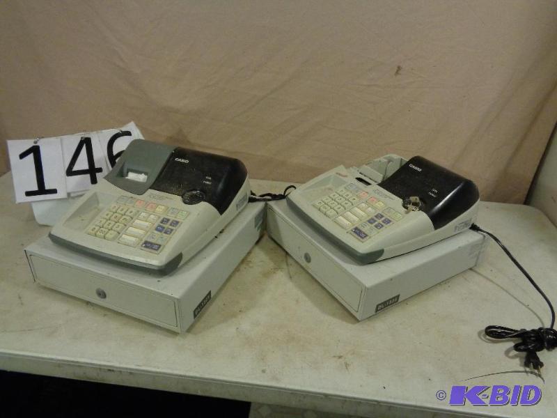 lot 146 image: 2 Casio Electronic Cash Registers. Both power...