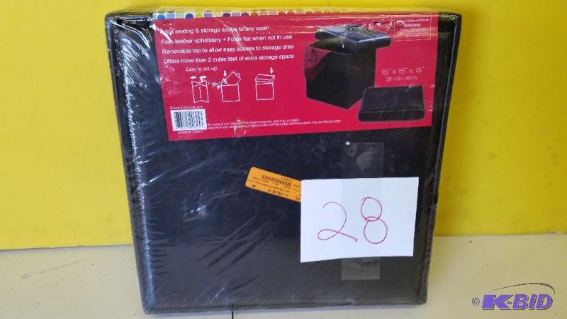 lot 28 image: Kennedy Home Collection Folding Storage Ottoman