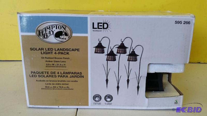 lot 29 image: Hampton Bay Solar LED landscaping lamps 4 pack