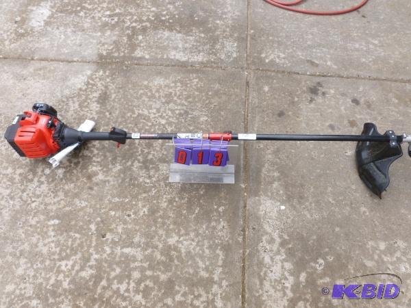 Troy Bilt 2 cycle gas weed trimmer with ex st...