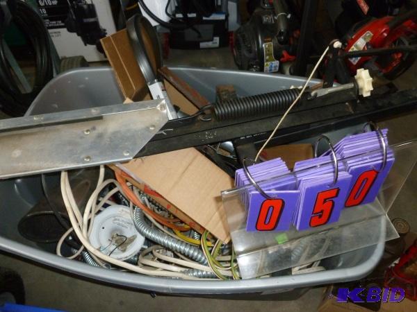 Box of misc and clay pigeon thrower. As shown...