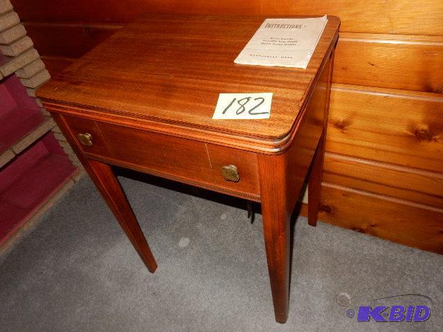 lot 182 image: Montgomery Wards Sewing machine.