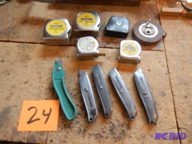 lot 24 image: 6 Tape measures, 5 linoleum knives