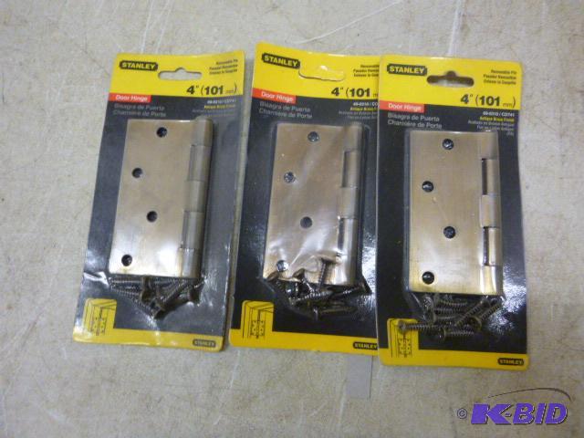 lot 134 image: 3 Stanley 4" Antique Brass Finish Hinges...