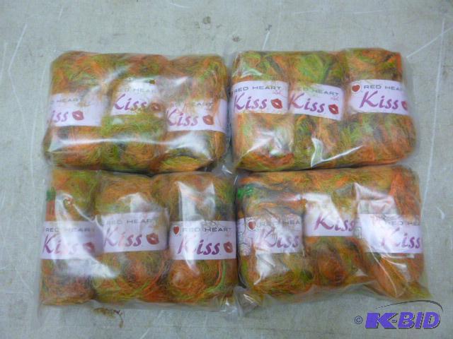 lot 188 image: 4 Packs of 3 Skeins Red Heart Kiss Yarn...