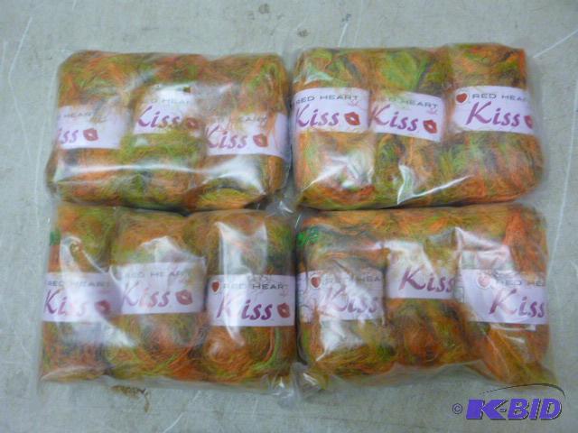 lot 189 image: 4 Packs of 3 Skeins Red Heart Kiss Yarn...