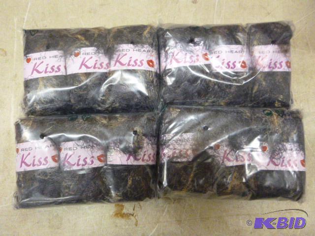 lot 192 image: 4 Packs of 3 Skeins Red Heart Kiss Yarn...