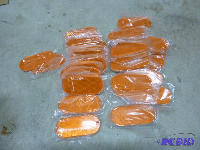 lot 77 image: Approximately 33 Amber Reflectors 4 12"...