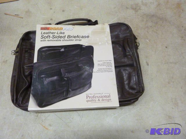 lot 83 image: Road Pro Leather-Like Soft-Sided Brief Case W...