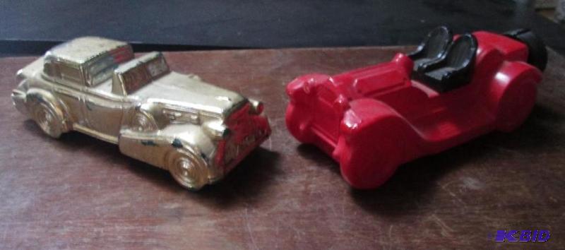 lot 110 image: Pair of Avon decorative cologne bottles. Cadi...