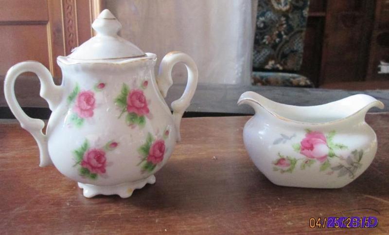 lot 29 image: Set of Lefton creamer and sugar bowl. Sugar b...