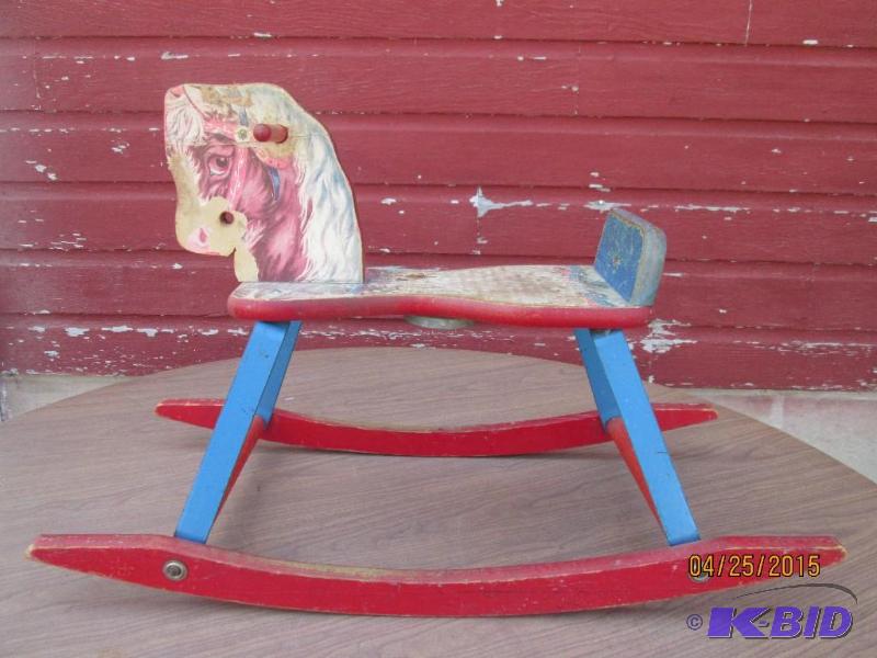lot 42 image: Vintage wooden rocking horse. Bell under the ...