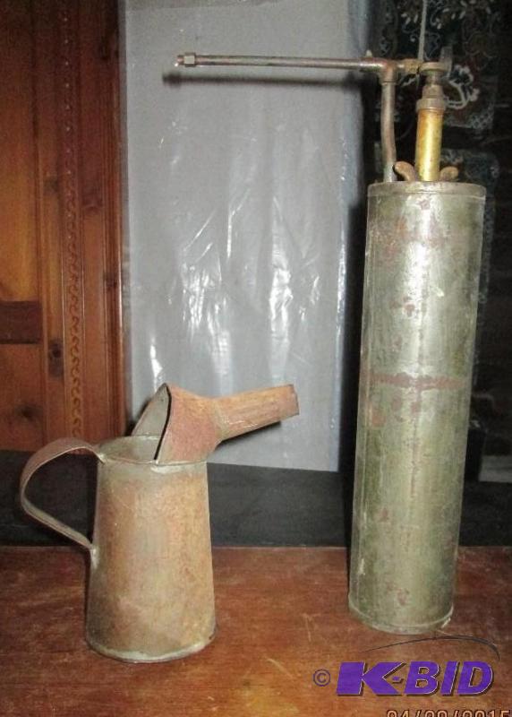 lot 67 image: Vintage oil cans....