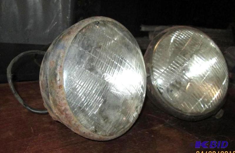 lot 76 image: Headlights from a vintage vehicle....