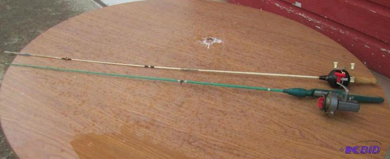 lot 79 image: Pair of fishing poles. 1 Zebco, the other Arn...