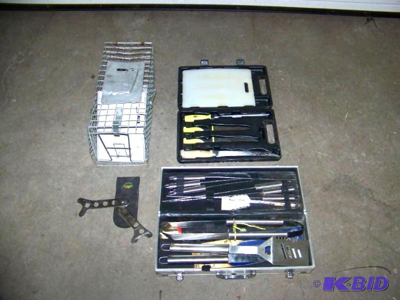 lot 11 image: Grilling Tools, Fish Filleting Kit, Live Animal Trap and Rib Spreading Tool