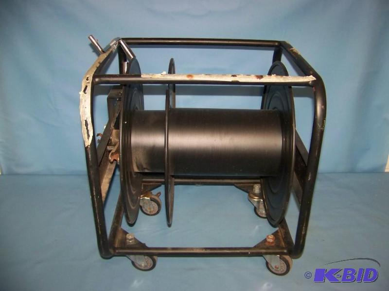 lot 27 image: Large, Rolling  Portable AudioVideoComputer Cable Spool Cart with Brake Lever