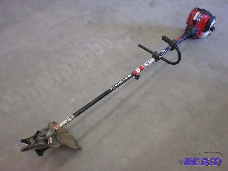 lot 23 image: Troy-Bilt 4-Cycle Brush Cutter, Runs & Op...