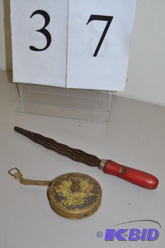 lot 37 image: Rasp and tape measure