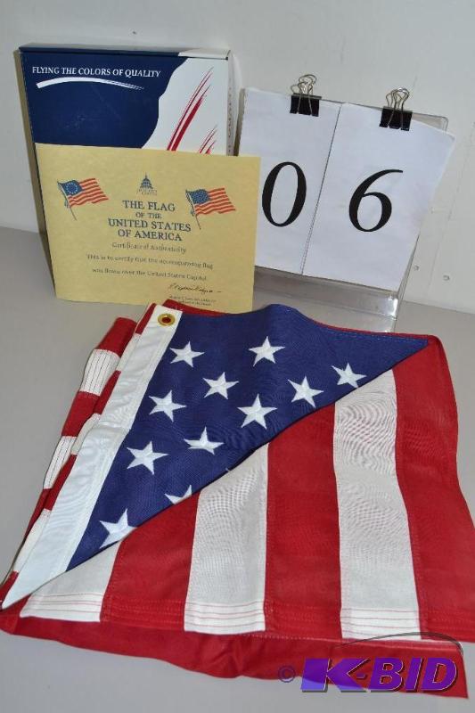 lot 6 image: American Flag Flown over capitol