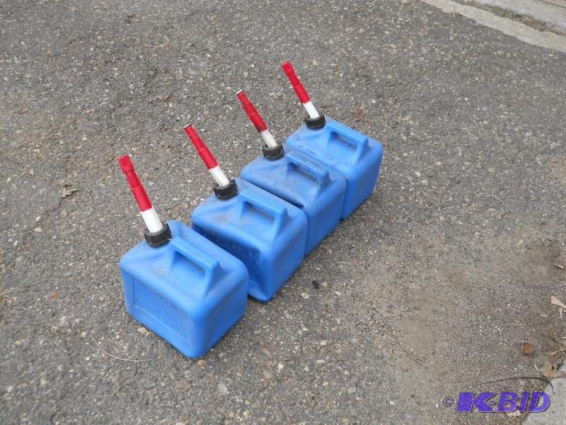 lot 11 image: Four 2 Gallon Kerosene Cans