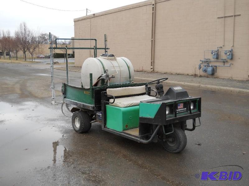 lot 2 image: Cushman Truckster with 15 Sprayer and Tank. Runs. NO RESERVE