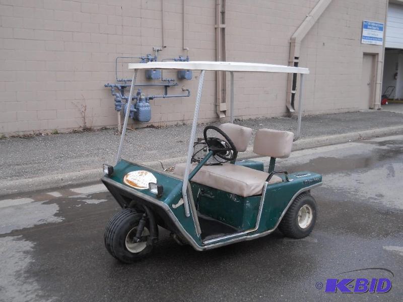 lot 6 image: EZ-GO Electric Golf Cart with Charger. Runs. NO RESERVE