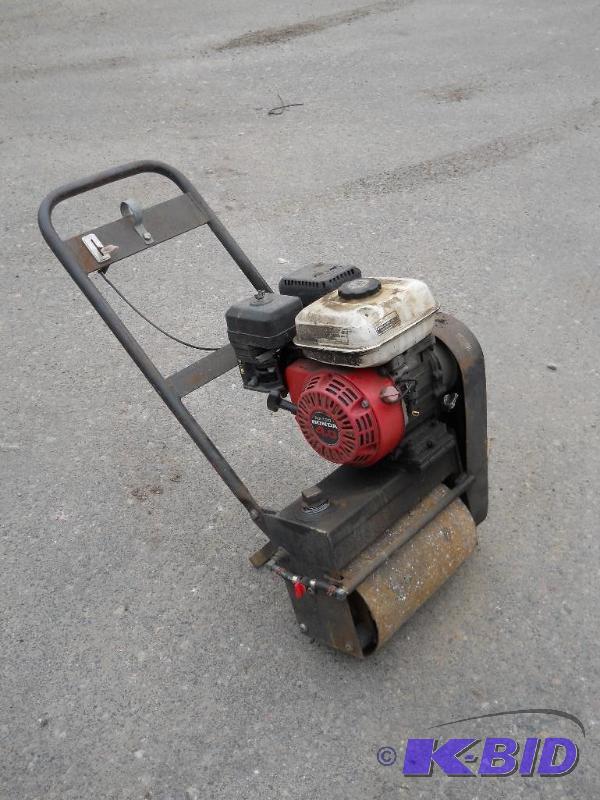 lot 9 image: Honda Walk Behind Powered Sod Roller