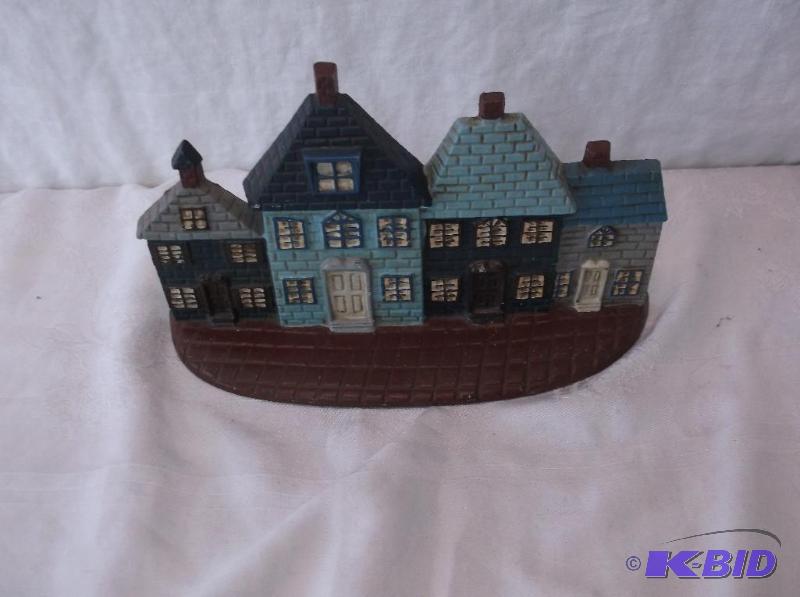 Large cast iron door stop measuring 10 12&qu...