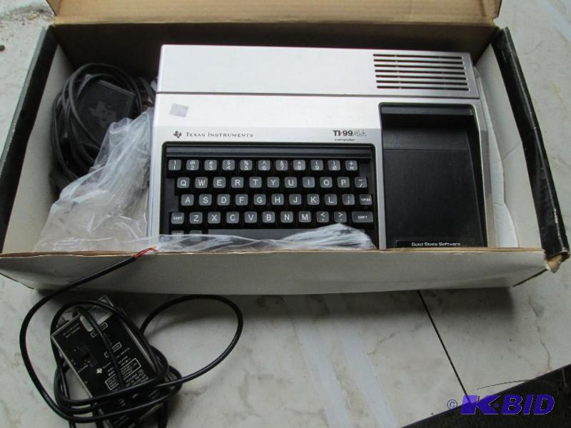 lot 105 image: Vintage Texas Instruments home computer, mode...