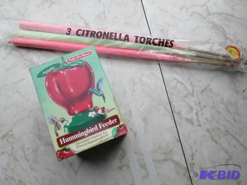 lot 111 image: 3 new citronella torches and a hummingbird fe...