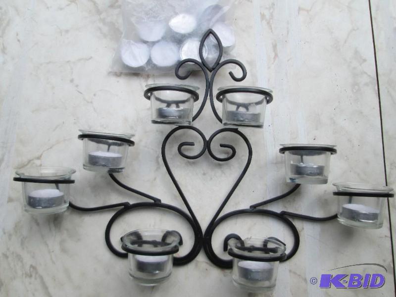 lot 112 image: Metal tealite holder...