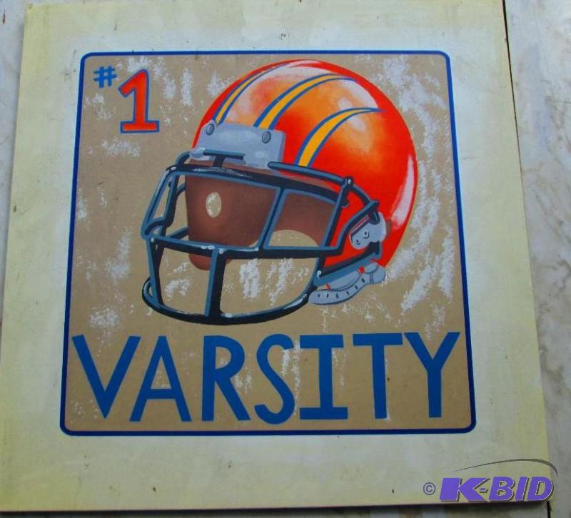 lot 117 image: helmet wall hanging, measures 18 x 18 inches...