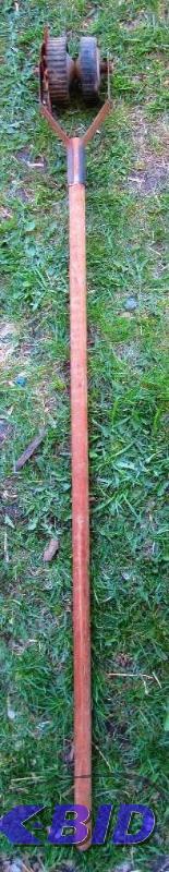 lot 12 image: Metal rail road tie pry bar 65 inches long...