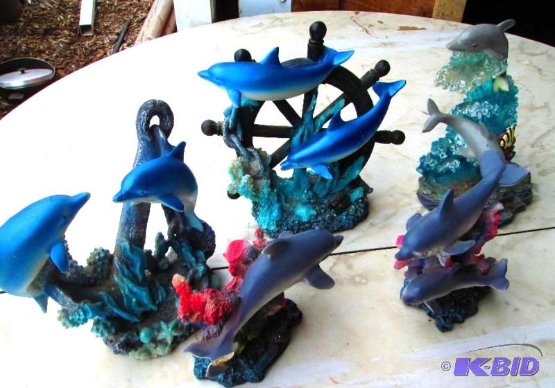 lot 132 image: Assorted dolphin figures, some have chips...