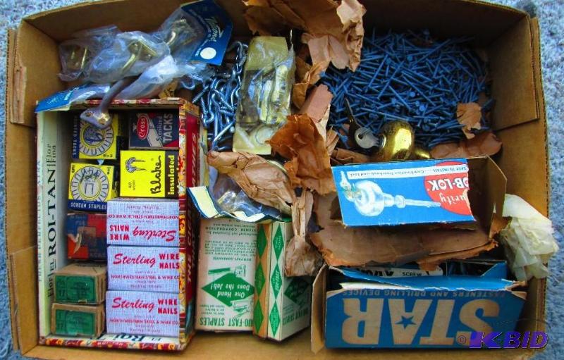 lot 18 image: Box of vintage nails, door knob with keystapl...